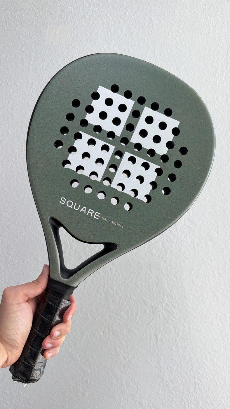 Custom olive-green 'Square Hallandale' padel racket with white block graphics