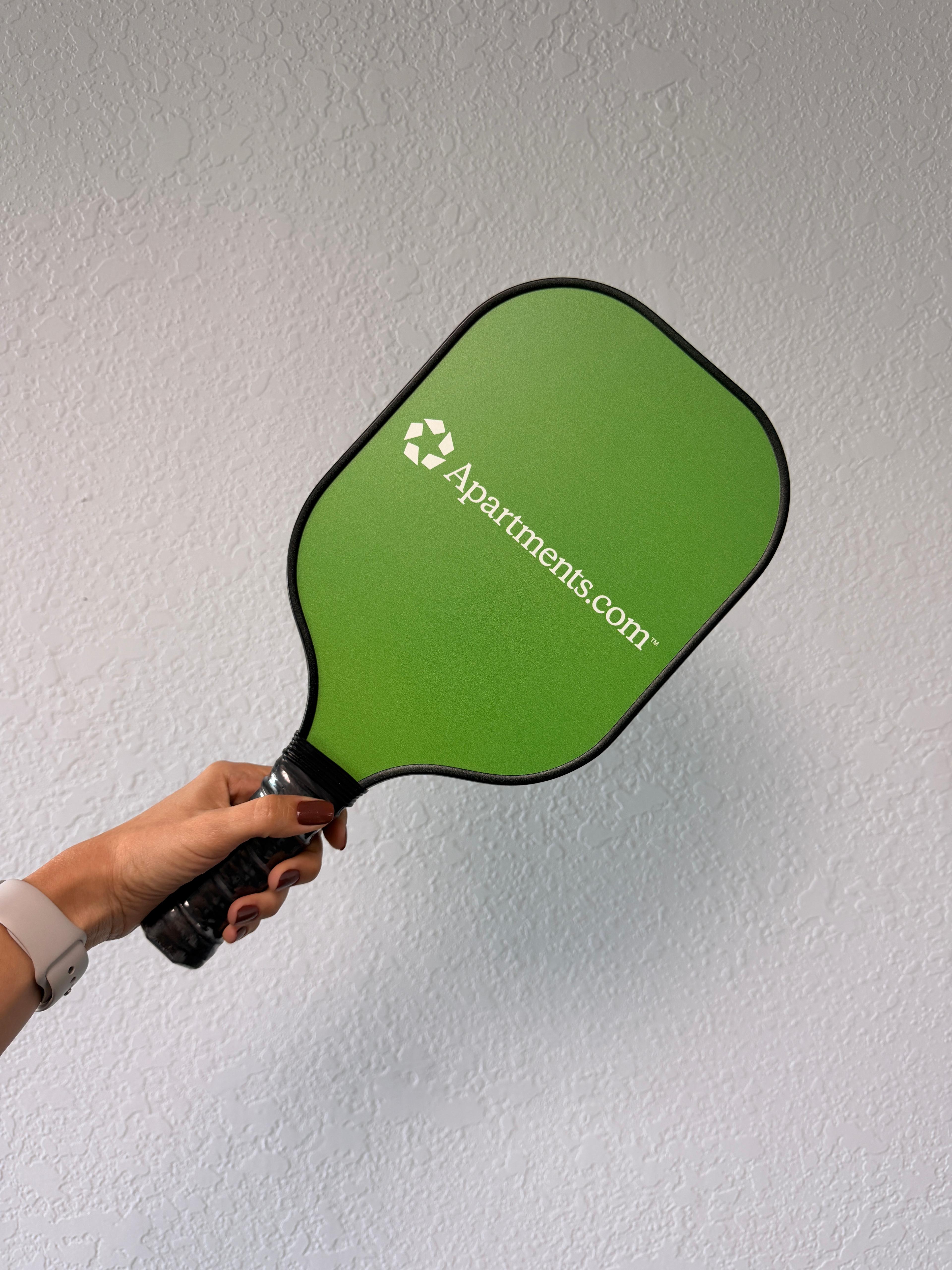 Custom Apartments.com branded pickleball paddle