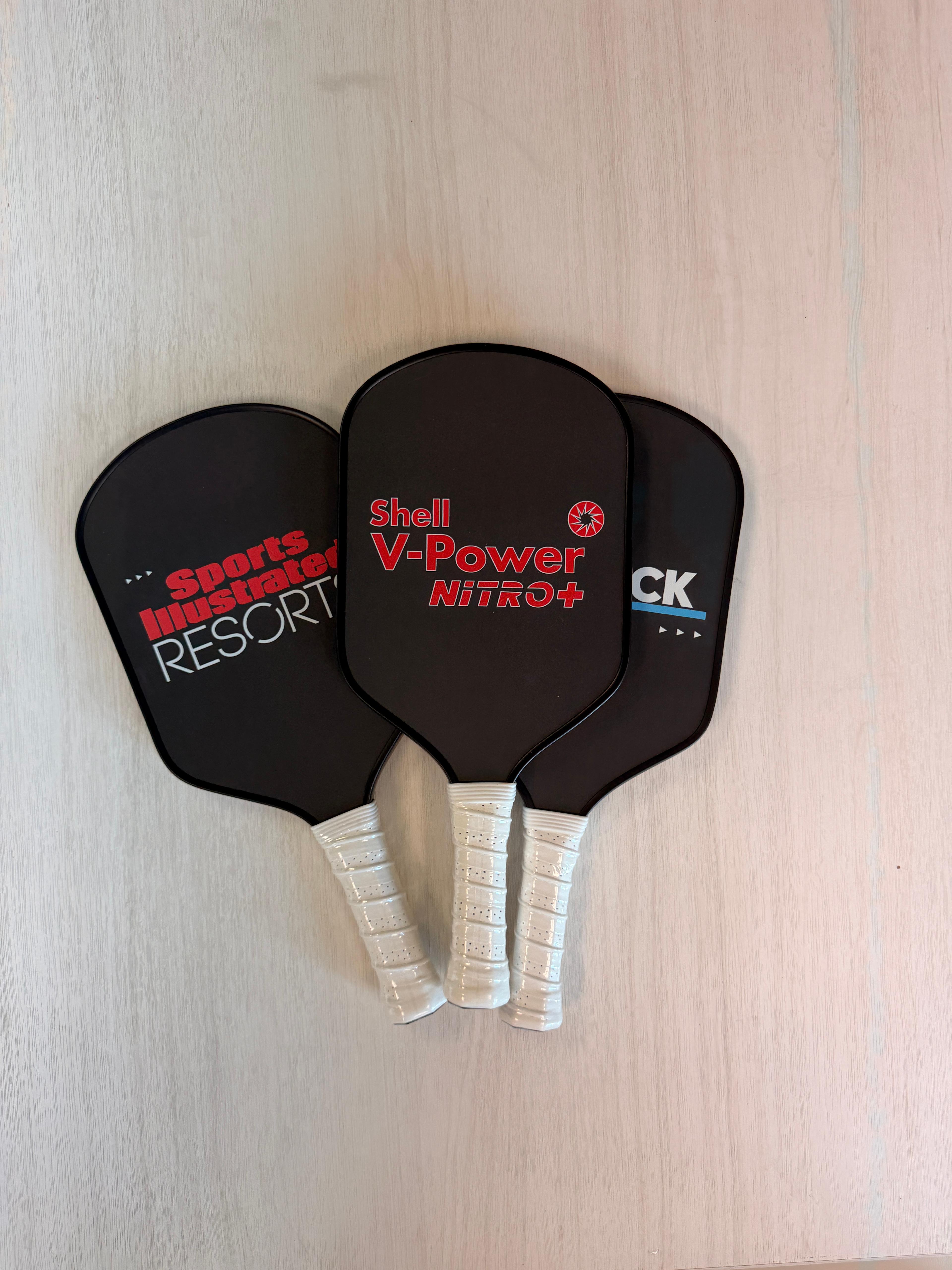 Custom Sports Illustrated Resorts and Shell V-Power pickleball paddles